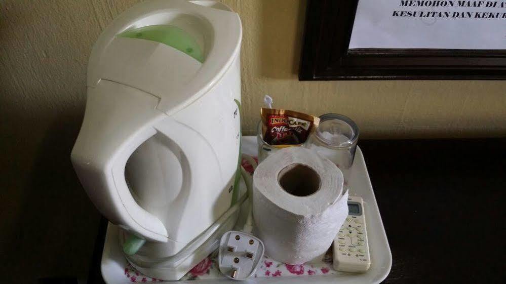 Hji Residensi Hotel Kuah Esterno foto